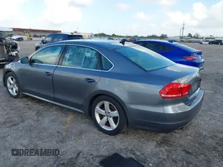 2013 Volkswagen Passat SE w/Sunroof & Nav with VIN 1VWBP7A35DC038217, listed as a IAAI auction lot 41944193 with 102,767 mi miles. Bid and sale history available at carsss.com. Image 3.