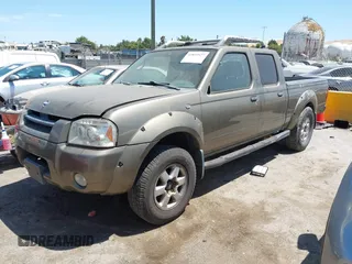 2002 Nissan Frontier SE with VIN 1N6ED29X92C346388, listed as a IAAI auction lot 42832927 with 229,601 mi miles and . Bid and sale history available at DreamBid. Image 2.