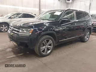 2018 Volkswagen Atlas SEL z VIN 1V2RR2CAXJC548261, wystawiony jako IAAI lot #41650478 z przebiegiem 123 399 mil mil oraz . Historia ofert i sprzedaży dostępna na DreamBid. Obrazek 18.