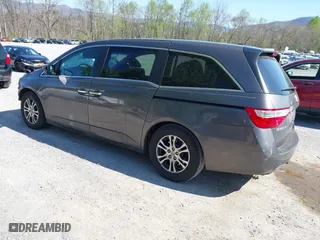 2011 Honda Odyssey EX-L with VIN 5FNRL5H60BB072101, listed as a IAAI auction lot 42002097 with 243,607 mi miles. Bid and sale history available at carsss.com. Image 3.