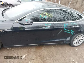 2017 Tesla Model S 100D with VIN 5YJSA1E25HF215778, listed as a IAAI auction lot 41692605 with Not Provided miles and . Bid and sale history available at DreamBid. Image 14.