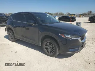2021 Mazda CX-5 Touring with VIN JM3KFACM5M0410995, listed as a Copart auction lot 48574735 with 36,603 mi miles and Salvage Title. Bid and sale history available at carsss.com. Image 4.