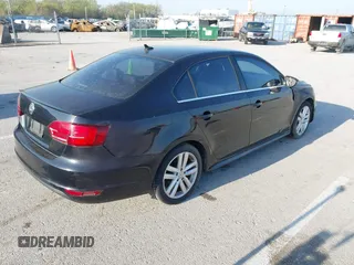 2013 Volkswagen Jetta GLI with VIN 3VW4S7AJ2DM300120, listed as a IAAI auction lot 42002950 with 106,304 mi miles and . Bid and sale history available at DreamBid. Image 4.