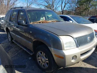 2004 Mercury Mountaineer Convenience z VIN 4M2ZU86W24ZJ40505, wystawiony jako IAAI lot #41326165 z przebiegiem 176 990 mil mil oraz . Historia ofert i sprzedaży dostępna na DreamBid. Obrazek 1.