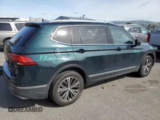 2018 Volkswagen Tiguan SEL with VIN 3VV3B7AX8JM051483, listed as a Copart auction lot 50076645 with 156,356 mi miles and Salvage Title. Bid and sale history available at DreamBid. Image 3.