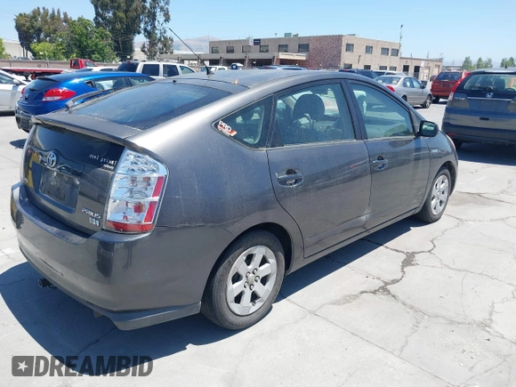 2007 Toyota Prius z VIN JTDKB20U173222332, wystawiony jako IAAI lot #42326043 z przebiegiem Nie podano mil oraz . Historia ofert i sprzedaży dostępna na DreamBid. Obrazek 4.