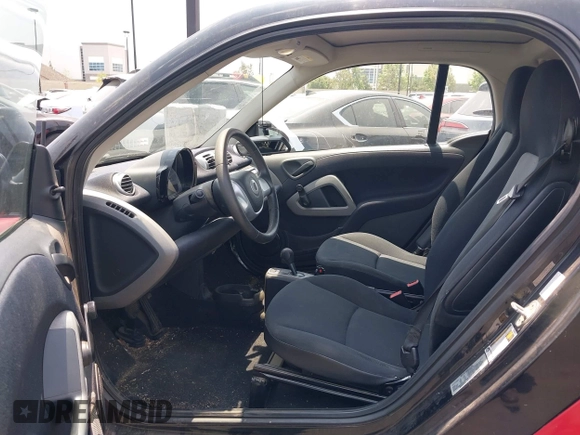 2014 Smart fortwo Pure z VIN WMEEJ3BAXEK744079, wystawiony jako IAAI lot #42421069 z przebiegiem 79 788 mil mil oraz . Historia ofert i sprzedaży dostępna na DreamBid. Obrazek 5.