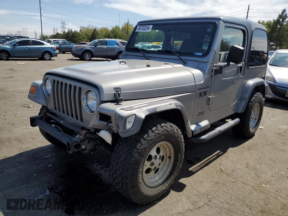 2002 Jeep Wrangler X with VIN 1J4FA39S32P708163, listed as a Copart auction lot 69703254 with 119,843 mi miles and Salvage Title. Bid and sale history available at carsss.com. Image 1.