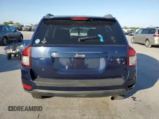 2014 Jeep Compass Sport with VIN 1C4NJCBA5ED749869, listed as a Copart auction lot 52779135 with 166,962 mi miles and Salvage Title. Bid and sale history available at carsss.com. Image 6.