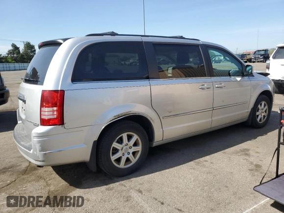 2010 Chrysler Town & Country Touring Plus with VIN 2A4RR8D18AR394752, listed as a Copart auction lot 52367295 with 157,320 mi miles and Salvage Title. Bid and sale history available at DreamBid. Image 3.