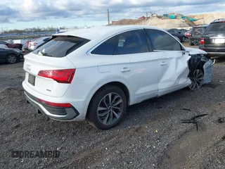 2023 Audi Q5 Sportback S line Premium Plus with VIN WA15AAFY9P2015093, listed as a IAAI auction lot 42024672 with 14,680 mi miles and . Bid and sale history available at DreamBid. Image 4.