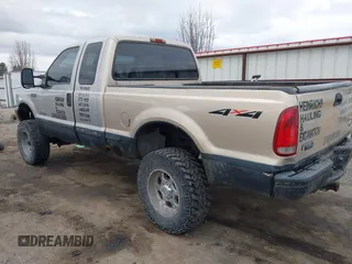 1999 Ford Super Duty F-250 XL with VIN 1FTNX21F1XED40173, listed as a IAAI auction lot 41712778 with 166,586 mi miles. Bid and sale history available at carsss.com. Image 3.