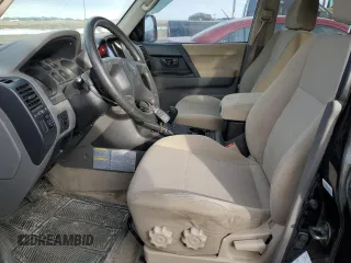2003 Mitsubishi Montero z VIN JA4NW31SX3J600944, wystawiony jako Copart lot #87611305 z przebiegiem 215 693 mil mil oraz Czysty tytuł • Clean title. Historia ofert i sprzedaży dostępna na DreamBid. Obrazek 7.