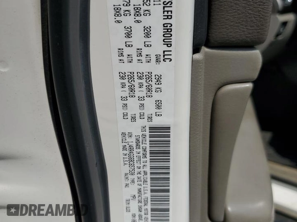 2011 Jeep Grand Cherokee Laredo with VIN 1J4RR4GG6BC657520, listed as a Copart auction lot 63558355 with 215,444 mi miles and Salvage title. Bid and sale history available at DreamBid. Image 13.