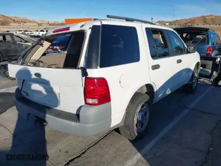2002 Ford Explorer XLS with VIN 1FMZU72E42UC41998, listed as a IAAI auction lot 41206022 with 115,284 mi miles. Bid and sale history available at carsss.com. Image 4.