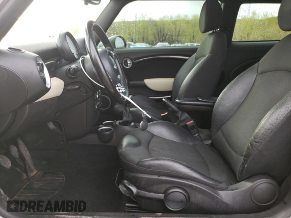 2012 MINI Hardtop with VIN WMWSU3C51CT186184, listed as a Copart auction lot 55090935 with 100,669 mi miles and Salvage Title. Bid and sale history available at DreamBid. Image 7.