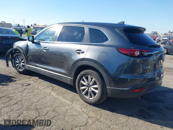 2017 Mazda CX-9 Sport with VIN JM3TCABY4H0128483, listed as a IAAI auction lot 41299667 with 142,343 mi miles and . Bid and sale history available at DreamBid. Image 3.
