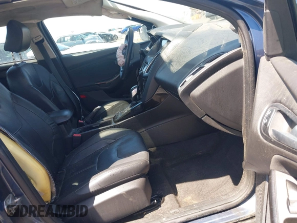2018 Ford Focus Titanium with VIN 1FADP3J21JL323767, listed as a IAAI auction lot 42375218 with 104,440 mi miles and . Bid and sale history available at DreamBid. Image 5.