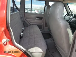 1996 Jeep Cherokee Sport with VIN 1J4FJ68S6TL213886, listed as a Copart auction lot 51462275 with 215,091 mi miles and Salvage title. Bid and sale history available at DreamBid. Image 11.