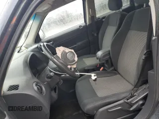 2014 Jeep Patriot Latitude with VIN 1C4NJPFA1ED651021, listed as a Copart auction lot 56947445 with 137,239 mi miles and Salvage title. Bid and sale history available at DreamBid. Image 7.
