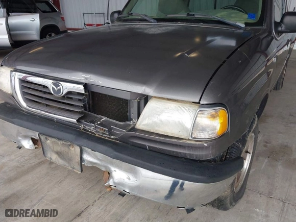 1999 Mazda B-Series 2WD Truck SE with VIN 4F4YR16C8XTM43366, listed as a IAAI auction lot 41891873 with NaN miles. Bid and sale history available at carsss.com. Image 6.