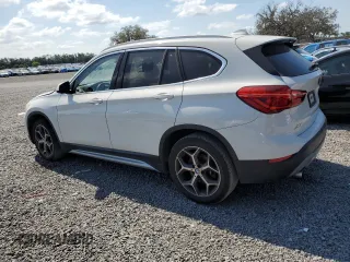 2018 BMW X1 sDrive28i with VIN WBXHU7C32J5L07666, listed as a Copart auction lot 54173465 with 132,514 mi miles and Clean Title. Bid and sale history available at DreamBid. Image 2.