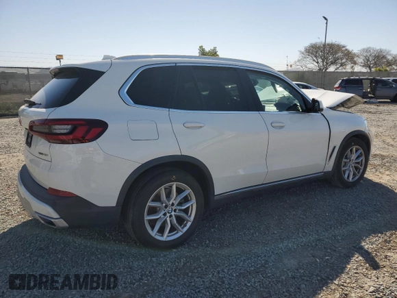 2020 BMW X5 xDrive40i with VIN 5UXCR6C02L9C46986, listed as a Copart auction lot 49099615 with Not provided miles and Salvage title. Bid and sale history available at DreamBid. Image 3.
