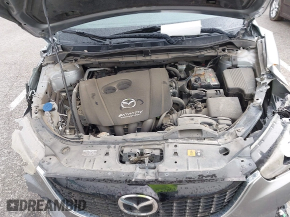 2014 Mazda CX-5 Touring with VIN JM3KE4CY1E0426409, listed as a IAAI auction lot 41924258 with 116,956 mi miles. Bid and sale history available at carsss.com. Image 10.