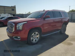 2015 GMC Yukon SLT with VIN 1GKS2BKC8FR231467, listed as a Copart auction lot 75245114 with 176,310 mi miles and Salvage Title. Bid and sale history available at carsss.com. Image 1.