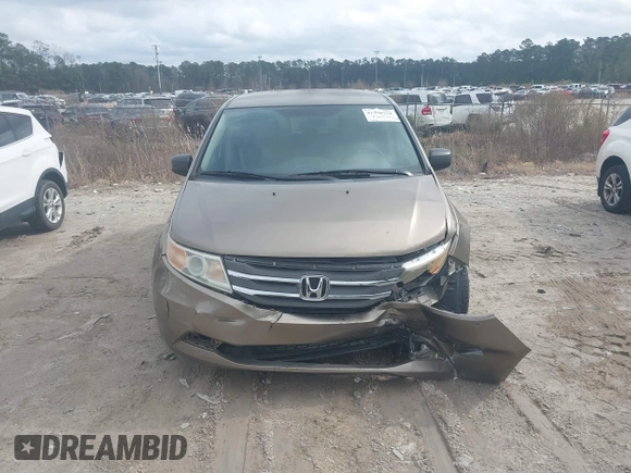 2012 Honda Odyssey LX z VIN 5FNRL5H25CB019912, wystawiony jako IAAI lot #41458224 z przebiegiem 158 980 mil mil oraz . Historia ofert i sprzedaży dostępna na DreamBid. Obrazek 13.