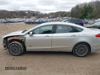2017 Ford Fusion Titanium with VIN 3FA6P0SU2HR153423, listed as a IAAI auction lot 42029438 with 106,596 mi miles and . Bid and sale history available at DreamBid. Image 14.
