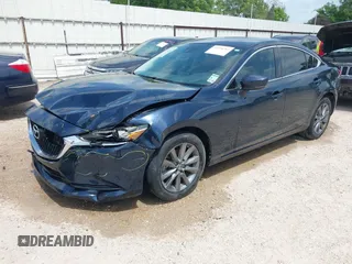 2018 Mazda 6 Sport with VIN JM1GL1UM7J1334658, listed as a IAAI auction lot 41938763 with 129,563 mi miles. Bid and sale history available at carsss.com. Image 2.