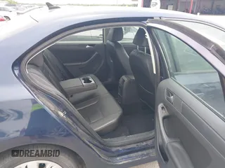 2014 Volkswagen Jetta SE z VIN 3VWD17AJ0EM402858, wystawiony jako IAAI lot #42663051 z przebiegiem 138 606 mil mil oraz . Historia ofert i sprzedaży dostępna na DreamBid. Obrazek 8.