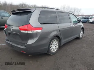 2012 Toyota Sienna XLE with VIN 5TDDK3DC7CS035444, listed as a IAAI auction lot 41640499 with 117,220 mi miles and . Bid and sale history available at DreamBid. Image 4.