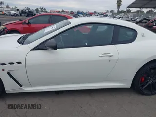 2012 Maserati GranTurismo MC Stradale with VIN ZAM45MLA9C0065671, listed as a IAAI auction lot 40990883 with 27,041 mi miles. Bid and sale history available at carsss.com. Image 14.