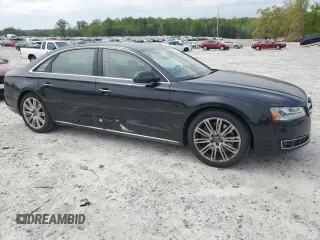 2015 Audi A8 L 4.0T with VIN WAU32AFD9FN024605, listed as a Copart auction lot 52086125 with 70,730 mi miles and Salvage Title. Bid and sale history available at carsss.com. Image 4.