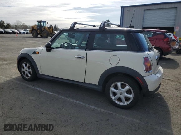 2010 MINI Hardtop with VIN WMWMF3C57ATU77370, listed as a Copart auction lot 50078605 with 187,187 mi miles and Salvage title. Bid and sale history available at DreamBid. Image 2.