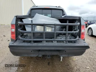 2011 Honda Ridgeline RTL with VIN 5FPYK1F52BB009042, listed as a Copart auction lot 69439004 with 119,889 mi miles and Salvage Title. Bid and sale history available at carsss.com. Image 6.