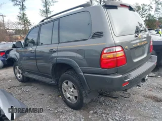 2001 Toyota Land Cruiser with VIN JTEHT05J012004269, listed as a IAAI auction lot 41037545 with 180,814 mi miles. Bid and sale history available at carsss.com. Image 3.
