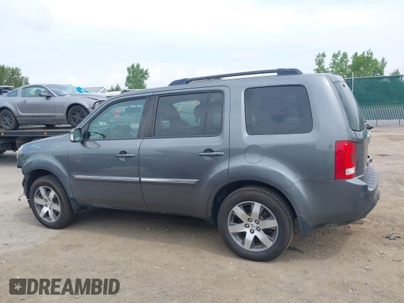 2013 Honda Pilot Touring with VIN 5FNYF3H9XDB024500, listed as a IAAI auction lot 42683695 with 151,441 mi miles and . Bid and sale history available at DreamBid. Image 15.