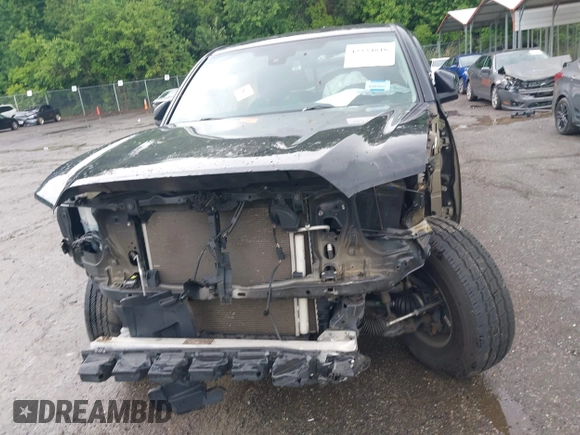 2018 Toyota Tacoma SR with VIN 5TFSX5EN1JX062523, listed as a IAAI auction lot 42334816 with 56,994 mi miles and . Bid and sale history available at DreamBid. Image 12.