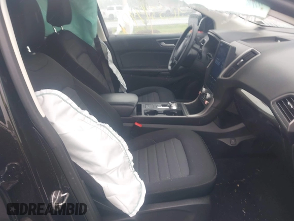 2022 Ford Edge SE z VIN 2FMPK4G94NBA99279, wystawiony jako IAAI lot #42351490 z przebiegiem 30 044 mil mil oraz . Historia ofert i sprzedaży dostępna na DreamBid. Obrazek 5.