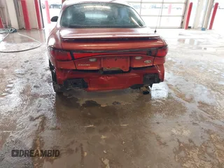 2000 Ford Escort ZX2 with VIN 3FAKP1133YR124283, listed as a IAAI auction lot 41210679 with 217,629 mi miles. Bid and sale history available at carsss.com. Image 6.