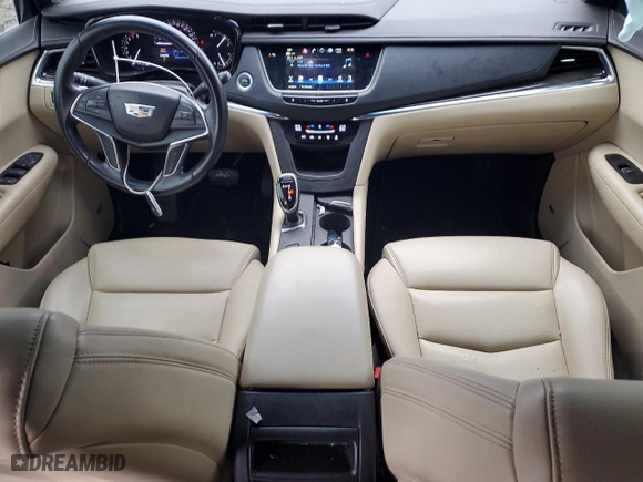 2019 Cadillac XT5 FWD with VIN 1GYKNARS0KZ148162, listed as a Copart auction lot 42972325 with 104,466 mi miles and Salvage Title. Bid and sale history available at carsss.com. Image 8.