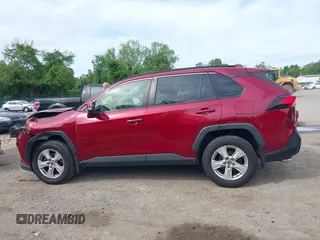 2019 Toyota RAV4 XLE with VIN JTMP1RFV2KD021348, listed as a IAAI auction lot 42198925 with 130,838 mi miles and . Bid and sale history available at DreamBid. Image 14.