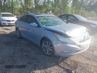 2012 Hyundai Sonata SE with VIN 5NPEC4AB7CH330570, listed as a IAAI auction lot 42108128 with 124,439 mi miles and . Bid and sale history available at carsss.com. Image 1.