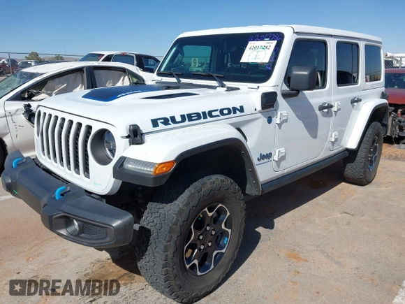 2023 Jeep Wrangler Rubicon with VIN 1C4JJXR63PW580370, listed as a IAAI auction lot 42017282 with 31,823 mi miles and . Bid and sale history available at DreamBid. Image 2.
