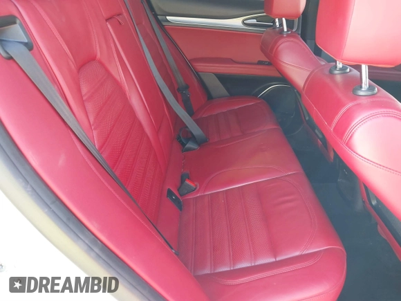 2019 Alfa Romeo Stelvio Ti Lusso z VIN ZASPAKBN1K7C36934, wystawiony jako IAAI lot #41534732 z przebiegiem Nie podano mil oraz . Historia ofert i sprzedaży dostępna na DreamBid. Obrazek 8.