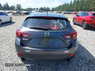 2015 Mazda 3 i Touring z VIN JM1BM1L73F1238360, wystawiony jako IAAI lot #42455285 z przebiegiem 124 319 mil mil oraz . Historia ofert i sprzedaży dostępna na DreamBid. Obrazek 17.