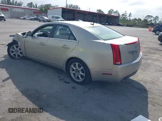 2008 Cadillac CTS AWD z VIN 1G6DG577280155483, wystawiony jako IAAI lot #41723609 z przebiegiem 132 756 mil mil oraz . Historia ofert i sprzedaży dostępna na DreamBid. Obrazek 3.